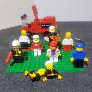 7 complete LEGO mini figs and firetruck